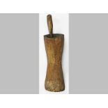 A LATE 19TH CENTURY CAPE YELLOWWOOD GRAIN PESTLE AND MORTAR (STAMPBLOK), of waisted cylindrical