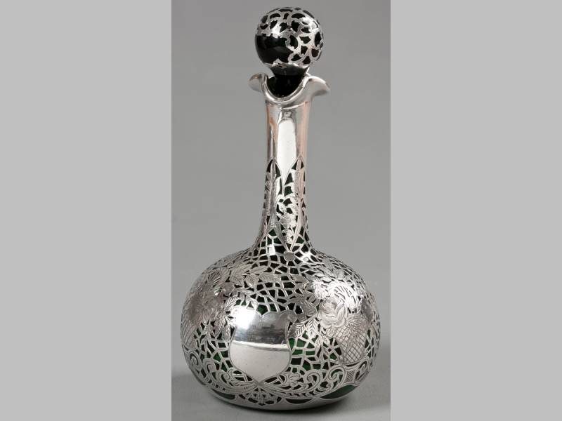 AN EDWARDIAN SILVER OVERLAY AND GREEN GLASS DECANTER BIRMINGHAM 1902, MAKERS MARKS INDECIPHERABLE,