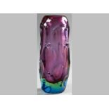 A MURANO COLOUR GLASS VASE, in organic form, in blue, green and purple, 31.5cm high.