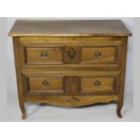 A 19TH CENTURY FRENCH COUNTRY HARDWOOD COMMODE, the serpentine top above two long drawers each