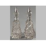 A PAIR OF EDWARDIAN SILVER AND CUTGLASS PERFUME BOTTLES BIRMINGHAM 1907, MAKERS MARKS