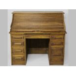 AN EARLY 20TH CENTURY AMERICAN OAK ROLL-TOP DESK BY HALE & SONS, NEW YORK, the tamboor shutter