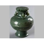 A CHINESE DARK GREEN HARD STONE BOWL AND COVER - 20TH CENTURY, the body carved with scrolls, the