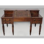 AN EARLY 19TH CENTURY ENGLISH MAHOGANY WRITING DESK, the upper-section with two short drawers