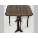 AN EDWARDIAN WALNUT SUTHERLAND TABLE, the rectangular top with cantered corners and inlaid with