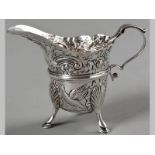 A 19TH CENTURY SILVER CREAMER DUBLIN, MARKS INDECIPHERABLE, C-scroll handle, body with reeded