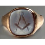 AN 18CT YELLOW GOLD SIGNET RING, oval form, agate carved with masonic insignia, 6.6g.