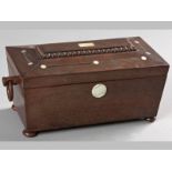 A VICTORIAN MAHOGANY TEA CADDY, of sarcophagus form, inlaid with mother-of-pearl ring-turned