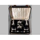 A 20TH CENTURY ENGLISH SILVER CRUET SET BIRMINGHAM, VARIOUS DATES AND MAKERS, comprising two mustard