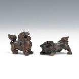 Two Signed Carved Wood Lion Netsuke