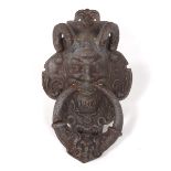 Grotesque Mask Door Knocker