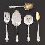 Group of Five Sterling Silver and Gold Washed Utensils, including by Gorham, Towle and International