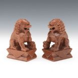 Chinese Pair of Gold Sandstone Foo Lions