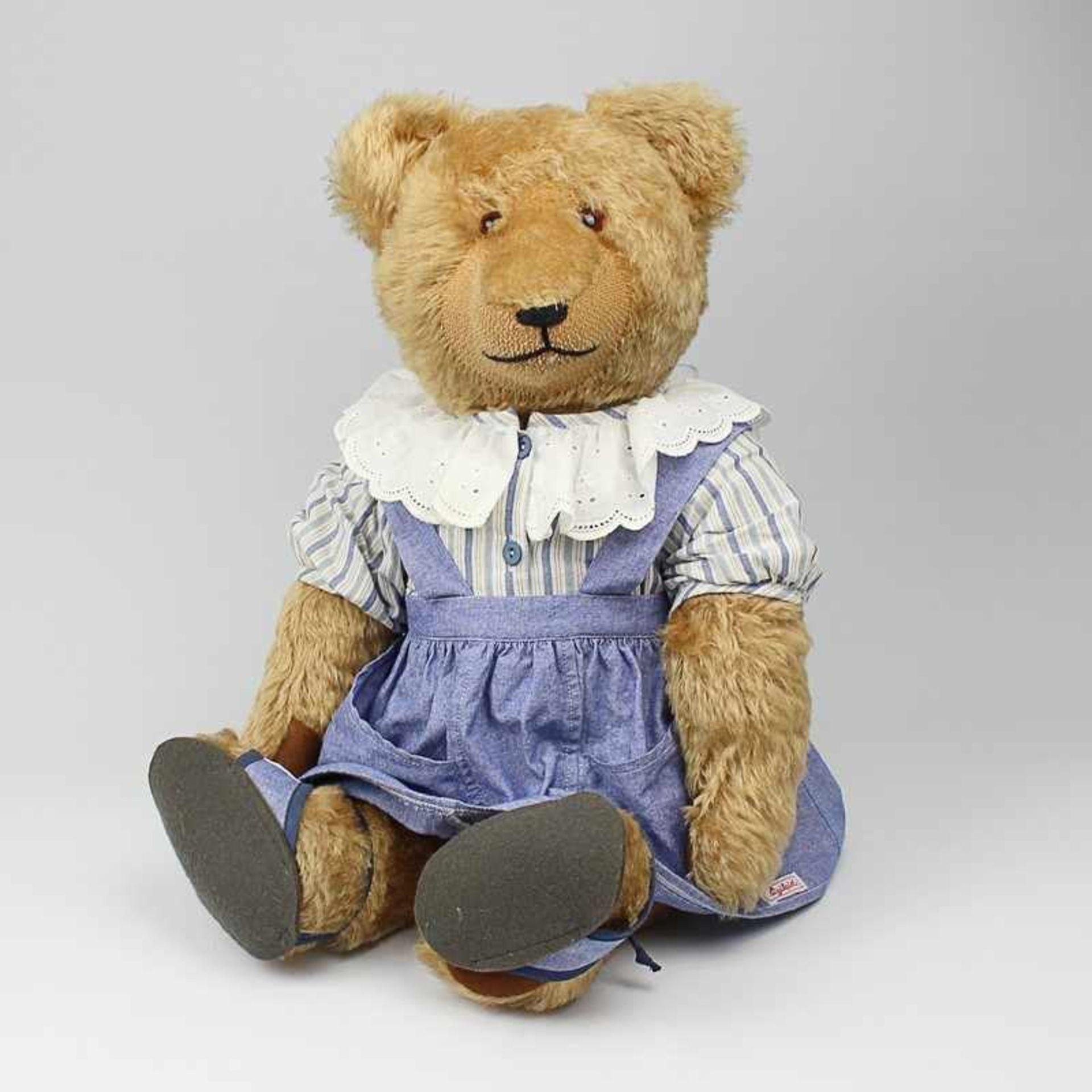 Sigikid - Plüschtier Teddy, blond, 5-fach gegliedert, gestickte Schnauze, Stimme, Buckel, blauer