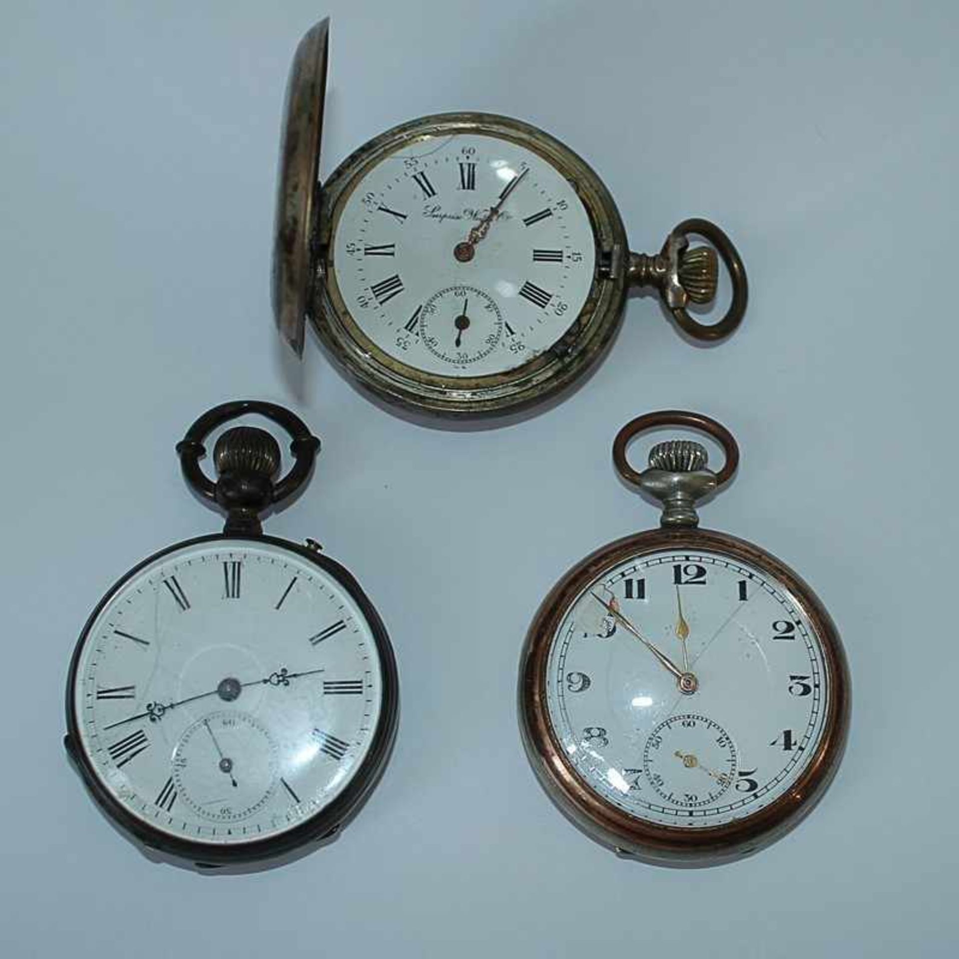 Konvolut - Taschenuhren 3 St., 2x Si, rund, 2x guillochiert, 1x läuft an, 1x o. Uhrglas, 1x o.