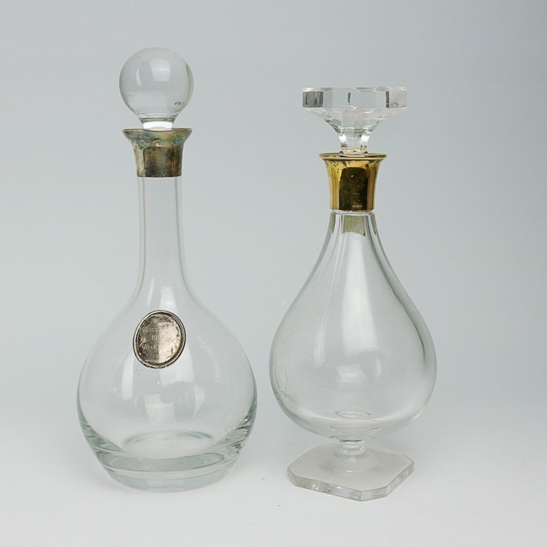 Paar Karaffen Si 800/925/gepr., 1x vergold., farbloser balusterförmiger Glaskorpus, Si-Montierung,