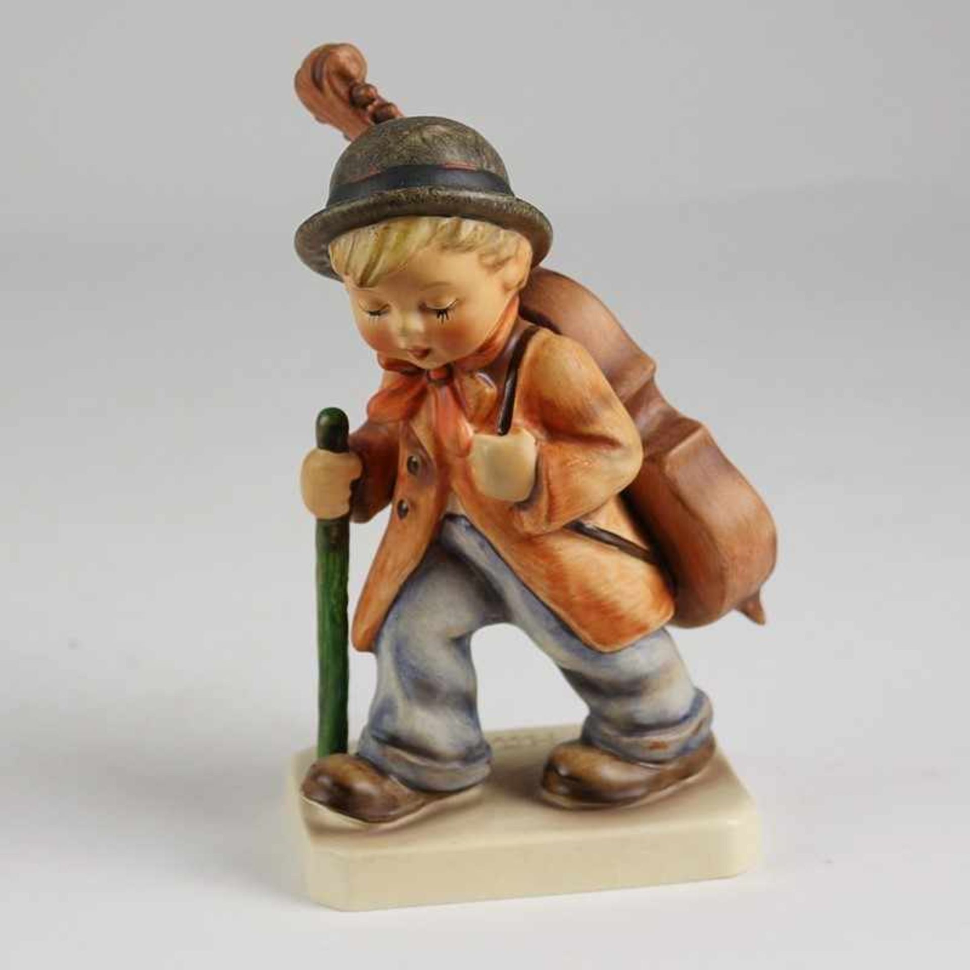 Hummel - Figur 1972-79, gem. Goebel, sign. am Sockel, Nr. 89/I, Junge mit Cello, farbig staffiert,