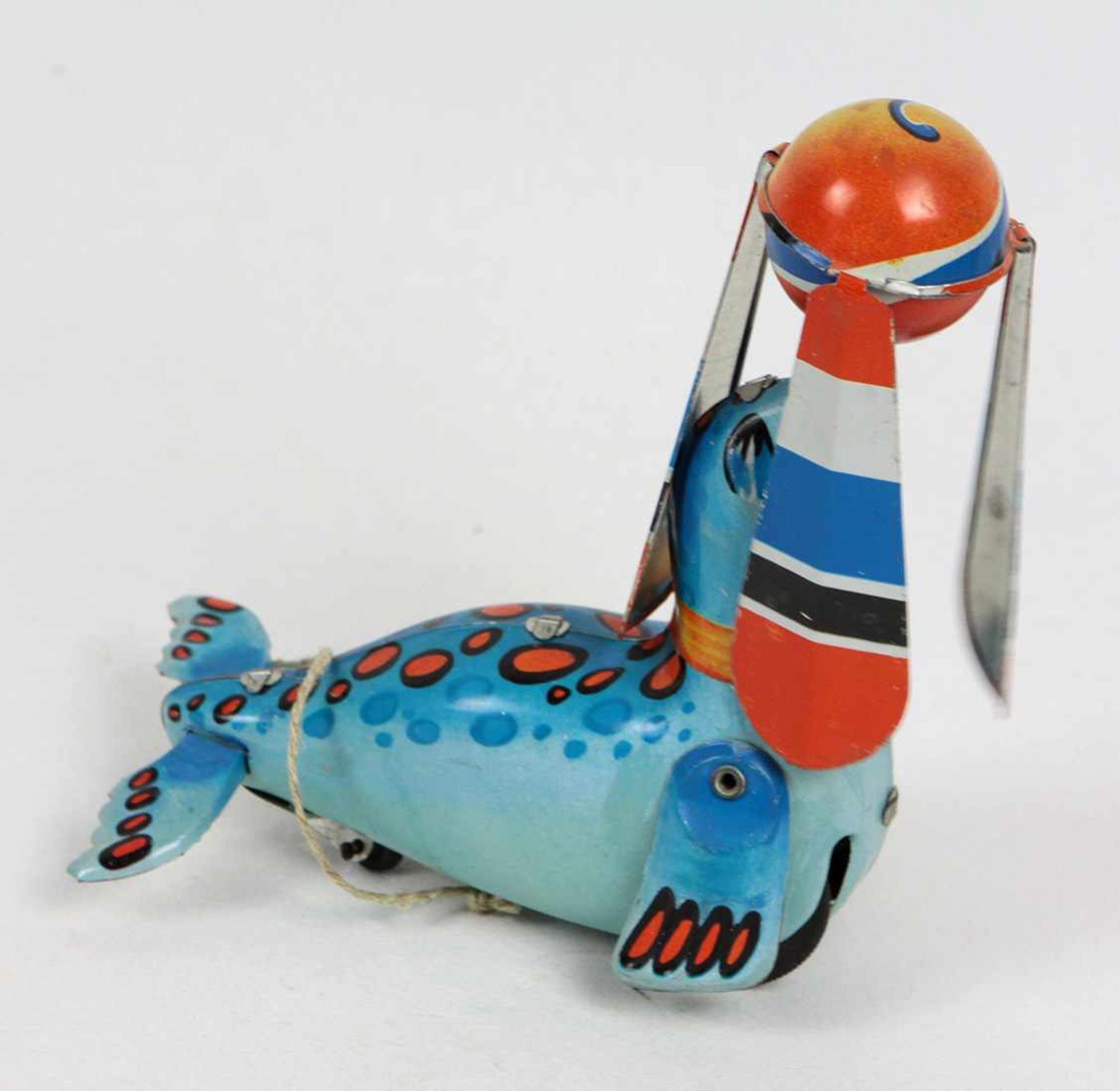 Seehund mit Ball u. Propeller Blech farbig lithographiert, ungemarkt, Hersteller wohl Fa. Girly