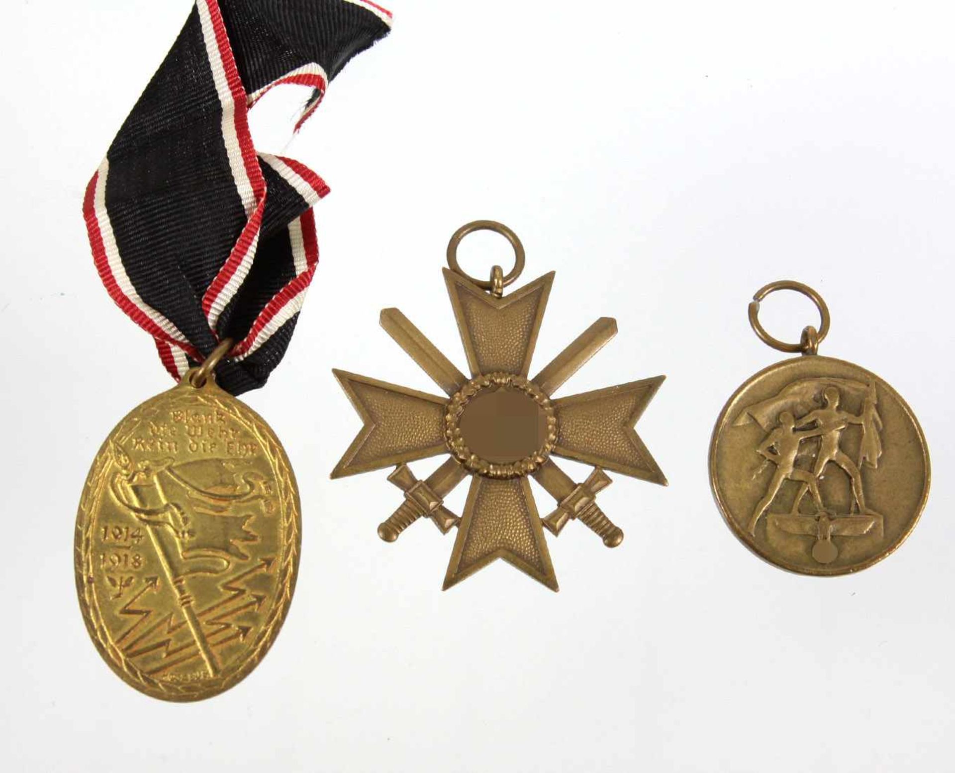 3 Abzeichen dabei KVK mit Schwertern, bronzierte Ausführung eines achtspitzigen Ordenskreuzes mit