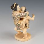 Erotische Steckfigur. Elfenbein, signiert, um 1920. Mann und Frau als zusammensteckbares Okimon.
