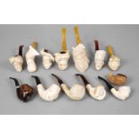 Konvolut Meerschaumpfeifen Anfang 20. Jh., 13 Stück, Meerschaum geschnitzt, teils dunkel gefasst,