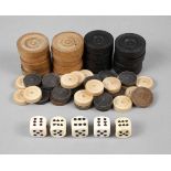 Konvolut Spielsteine Mitte 19. Jh., Holz gedrechselt, teils ornamental verziert und farbig