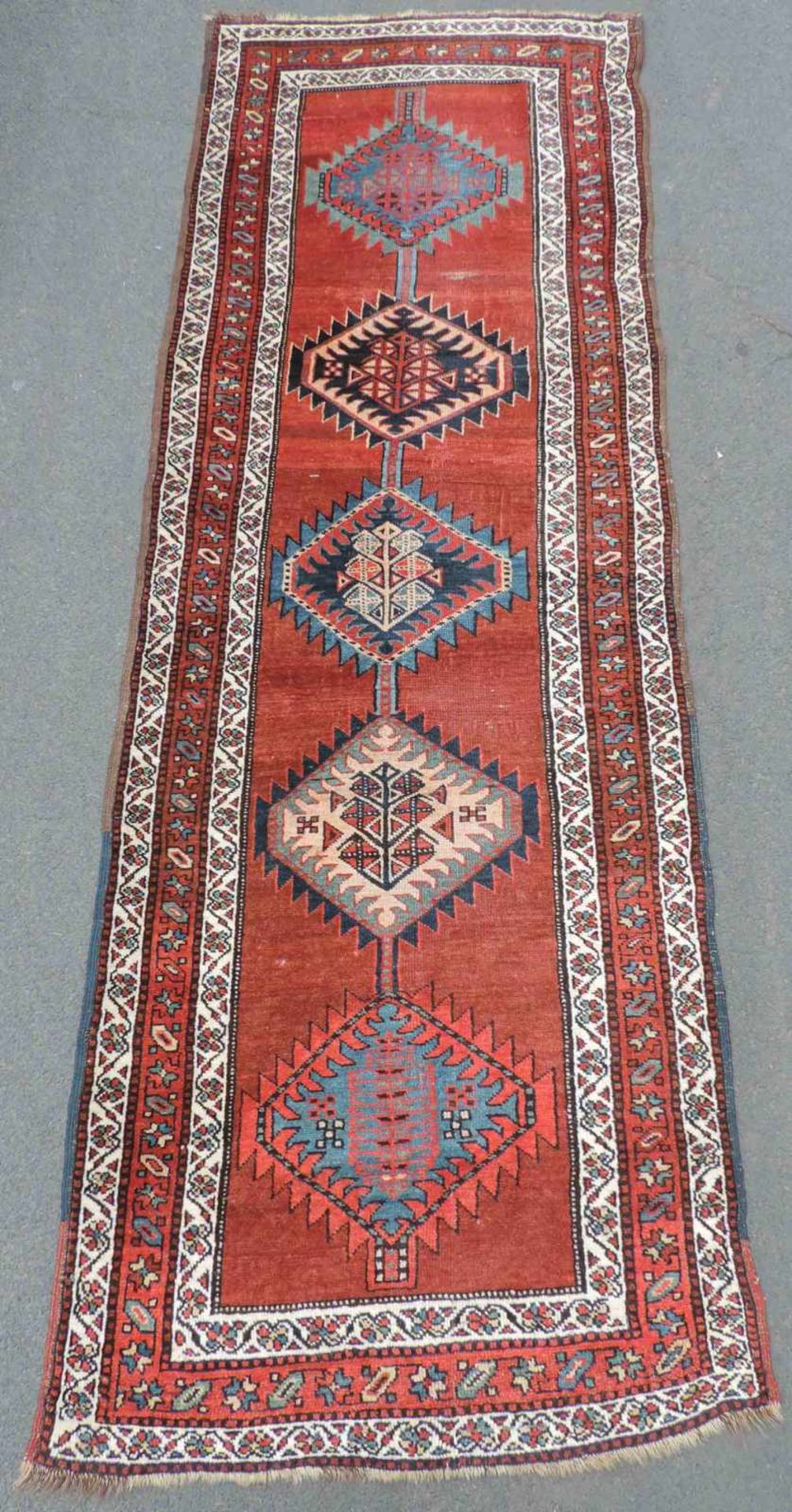 Schah - Savan Kurde Stammesteppich. Iran. Antik, 19. Jahrhundert. 294 cm x 100 cm. Handgeknüpft.