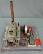 Modell Dampfmaschine. Wohl Wilesco. 34 cm x 29 cm. Steam engine proably by Wilesco. 34 cm x 29 cm.