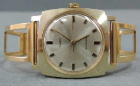 Herrenarmbanduhr, Timex, um 1970. 43 Gramm Brutto. Funktion nicht geprüft. Armband 750 Gold. Timex