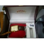 A Rotary tank watch with leather strap in original box.