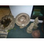 Garden ornaments including two gnomes. A dolphin bird bath and a shell planter [hall]