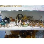 A collection of Wade ware including Whimsies, spoon rest, tortoises and an ashtray, three Poole