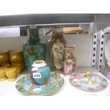 A collection of Oriental items including a cloisonne vase, a pair of Canton famille rose vases