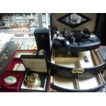 A modern black leather jewel box, wrist watches including a Seiko chronometer, Halcyon Days