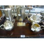 An impressive Chinese trade silver composite tea and coffee service on tray, finely hammered and