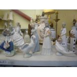 Two Lladro figurines of girls plus four further figurines of girls including those made by Nao and