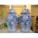 A pair of impressive large Oriental blue and white vases with covers decorated with dragons [s1]