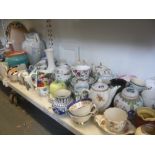 Two shelves of decorative china comprising part tea services including Coalport, Royal Grafton and