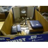 A large carton of plated cutlery, mainly in a reeded pattern by Silvaseal, some in cases, etc.,