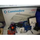 A Commodore Omega 500 Games system and games [G22]