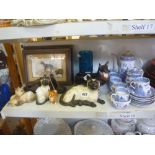 A collection of Beswick animals comprising - corgi 'Black Prince', plus another, three Siamese cats,