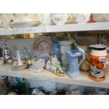 A good collection of 1930's Wade jugs including parrot handled, a quantity of figurines, a set of