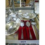 An Elizabeth II silver shell butter dish, a sauceboat, two 1977 Silver Jubilee teaspoons, an 800