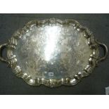 A fine large Old Sheffield plate tea tray of shaped oval form with scrolled border, chased with