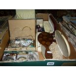 A carton of costume jewellery, wrist watches, coins including a Millennium £5, decorative mirror,