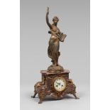 TABLE CLOCK, FRANCE EARLY 20TH CENTURY with allegorical figure of the 'science' in antimony. Base in