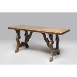 STAINED WALNUT WOODEN REFECTORY TABLE, EARLY 20TH CENTURY with rectangular top and legs volute