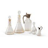 FIVE BOTTLES IN GLASS, 19TH-20TH CENTURY some blow ones. A bottle in glass cut with versaotio in