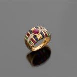 RING to band in yellow gold 18 kts., embellished with ruby central oval cut and sapphires,