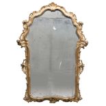 GILDED WOOD WALL MIRROR, PROBABLY NAPLES, LATE 18TH CENTURY Measures cm. 136 x 94. PROVENANCE